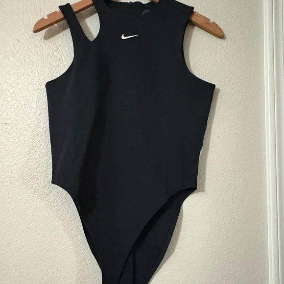 Nike Black Sleeveless Bodysuit NWT
Size M. Cute shoulder cutout detail. Stretchy - Picture 2 of 16